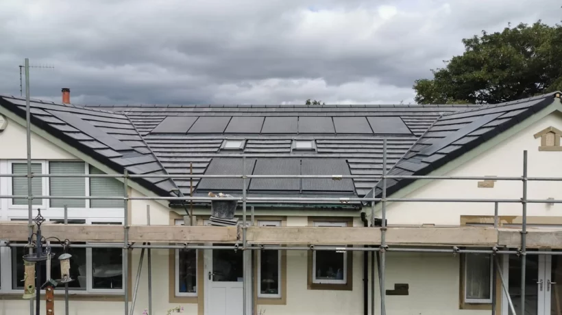 Solar Panels Being Installed On A House In Yorkshire - used to illustrate the question: Are Solar Panels Worth Installing In The UK?